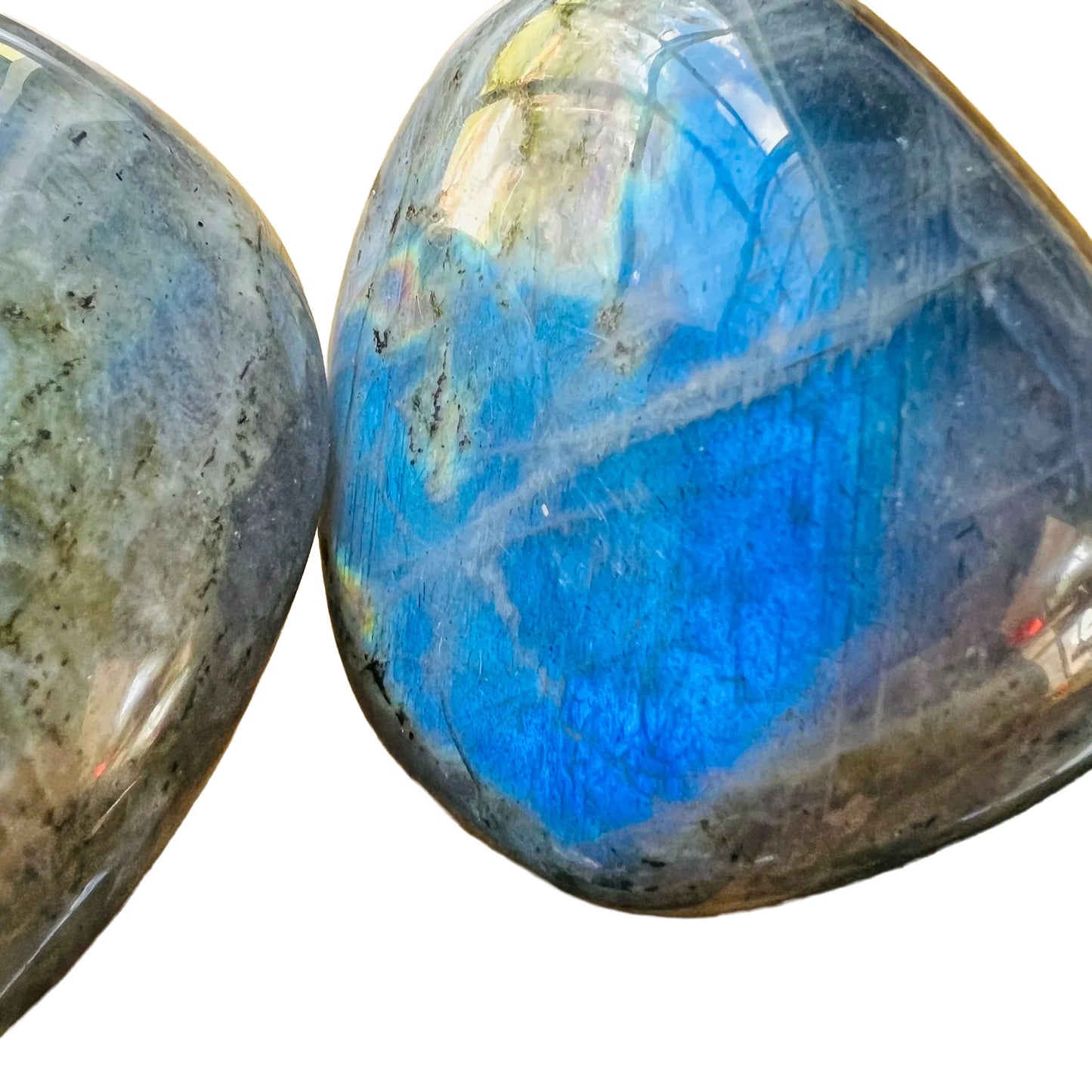 Plan view of Labradorite palm stone, showing characteristic finish.
