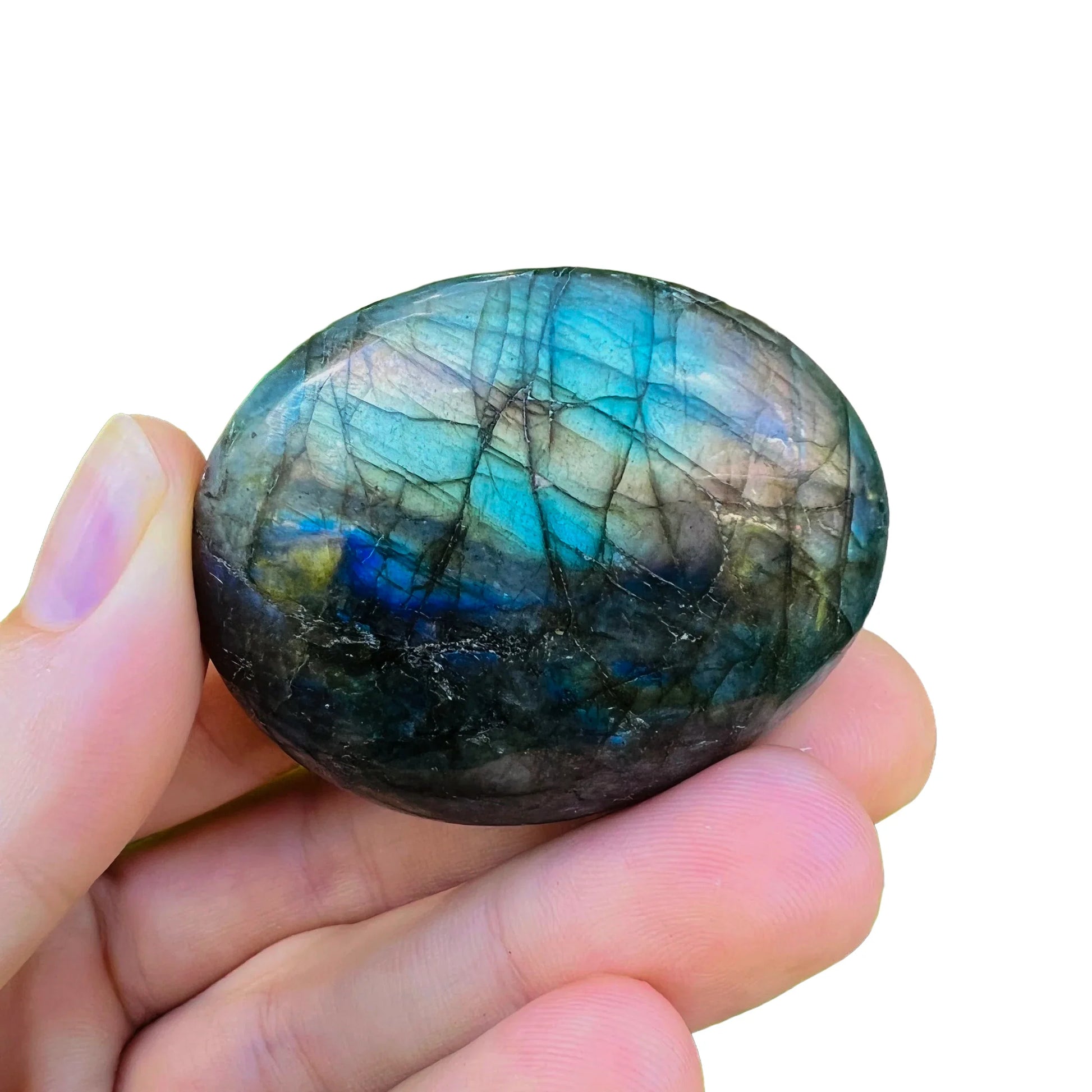 Held in palm of a Labradorite palm stone, from Atsimo-Andrefana, Madagascar, associated with Manifestation, shown at hand scale.