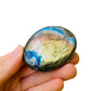 Back view of Labradorite palm stone, from Madagascar.