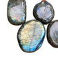 Size comparison with a Labradorite palm stone, sourced from Atsimo-Andrefana, Madagascar.