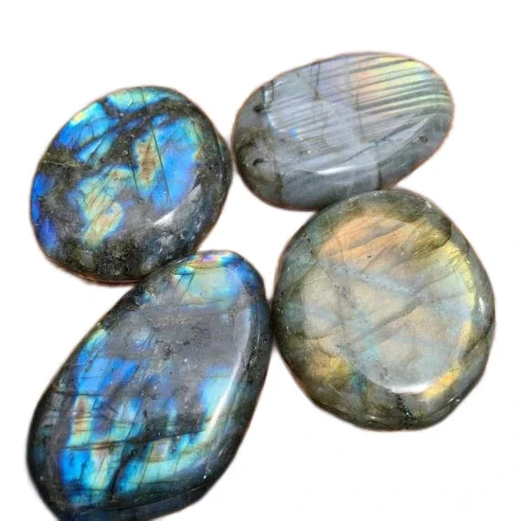 Detail shot of Grade AAA Labradorite palm stone under natural light