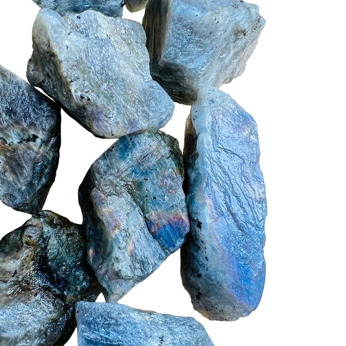Hand-scale view of Labradorite raw crystal, from Atsimo-Andrefana, Madagascar, set to give a sense of weight.
