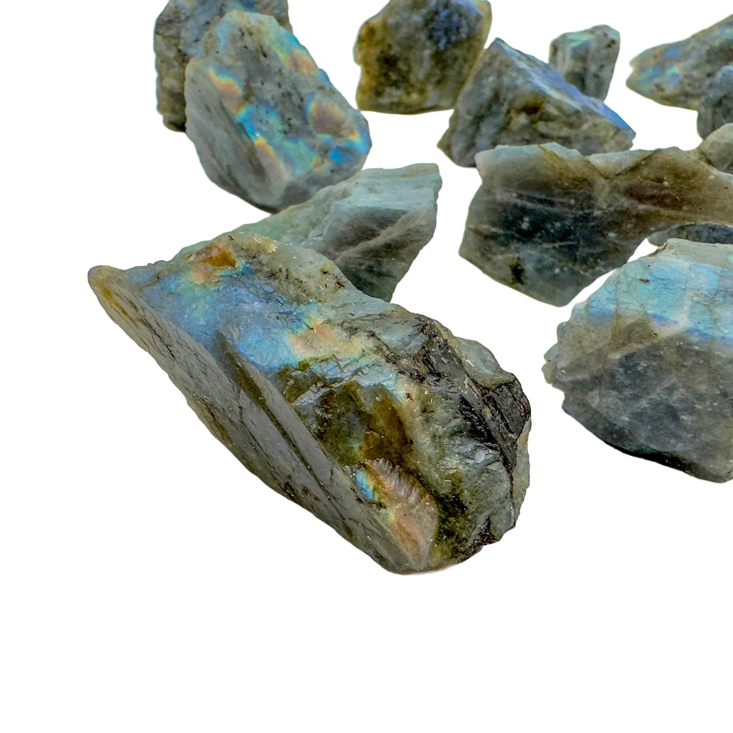Side profile of Grade AA Labradorite raw stone, showing natural patina.