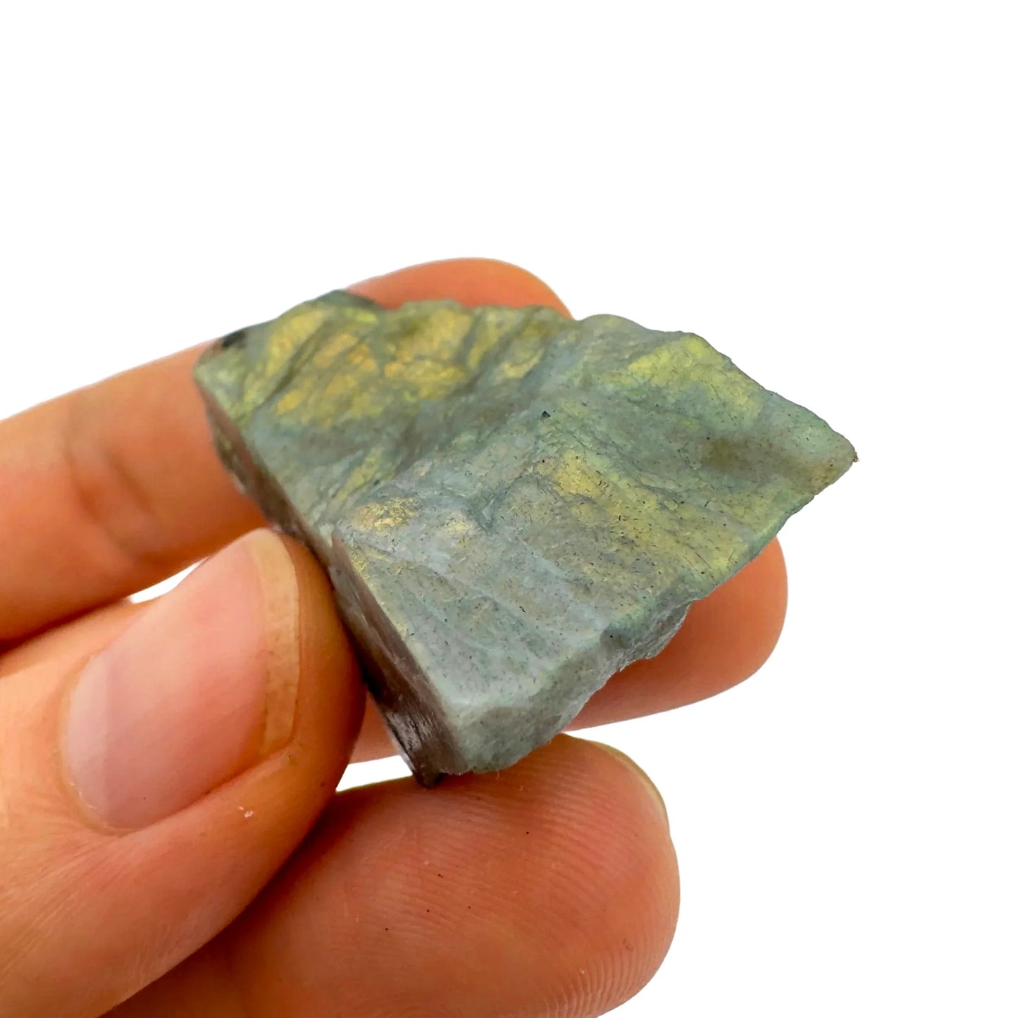 Detail shot of Grade AA Labradorite raw under natural light