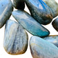 Top view of Labradorite tumbled stone, showing glassy finish, hand-selected from Atsimo-Andrefana, Madagascar.