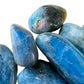 Alternate angle of Grade AA Labradorite tumbled stone, showing characteristic patterning.