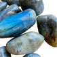 Palm-scale view of a Labradorite tumbled stone worked with for Intuition and Protection.