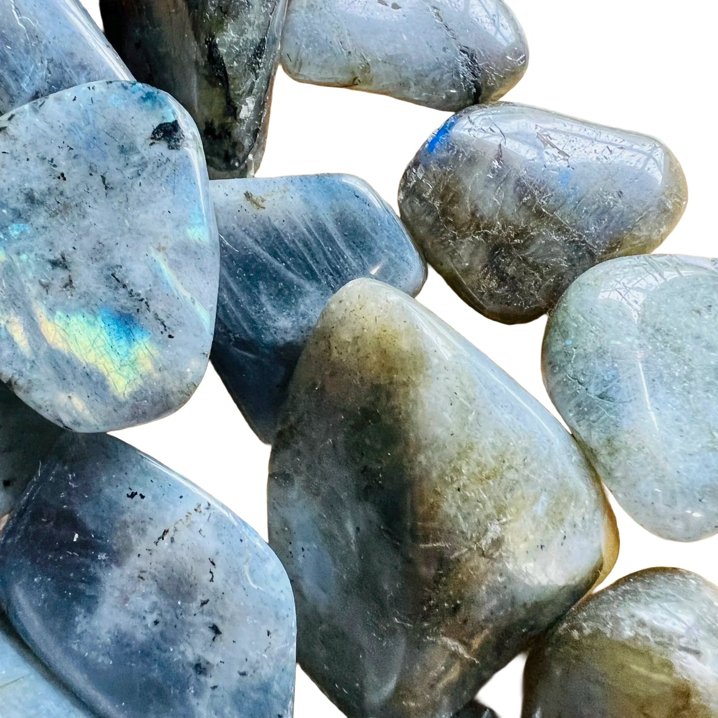 Natural light view of a Labradorite tumbled stone, sourced from Atsimo-Andrefana, Madagascar.