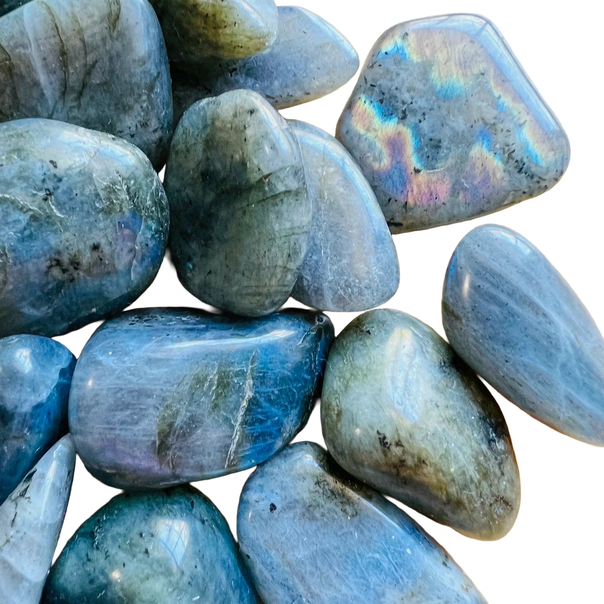 Magnified detail of Labradorite tumbled stone, showing color depth, sourced from Madagascar.