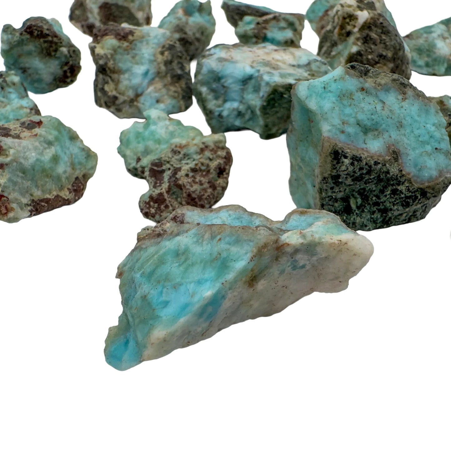 Detail shot showing Larimar raw stone, showing characteristic finish, often worked with for Stress Relief.