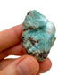 Detail shot of Grade A Larimar raw under natural light