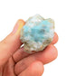 Profile shot of Larimar raw stone, hand-selected from Barahona Province, Dominican Republic, showing natural form.