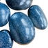 Near view of Lazulite palm stone, from Madagascar, showing natural texture.