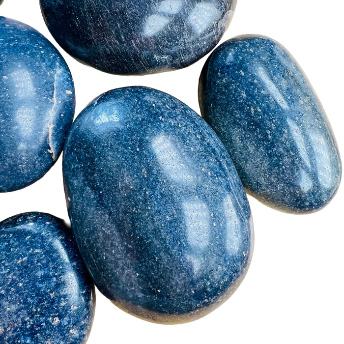 Near view of Lazulite palm stone, from Madagascar, showing natural texture.