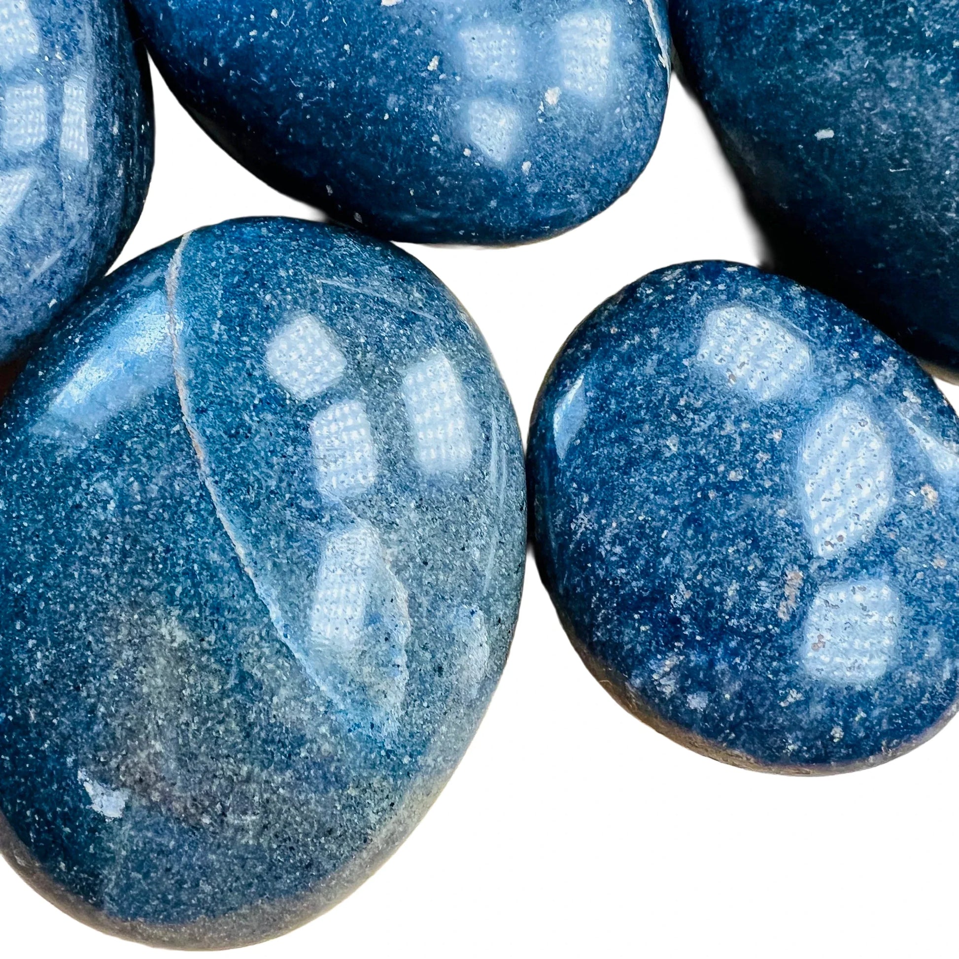 Profile shot of Lazulite palm stone, drawn on for Intuition and Meditation.