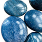 Rear view of Lazulite palm stone, showing natural texture, drawn on for Intuition.