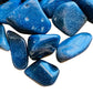 Side angle of Lazulite tumbled stone, hand-selected from Amoron'i Mania, Madagascar.