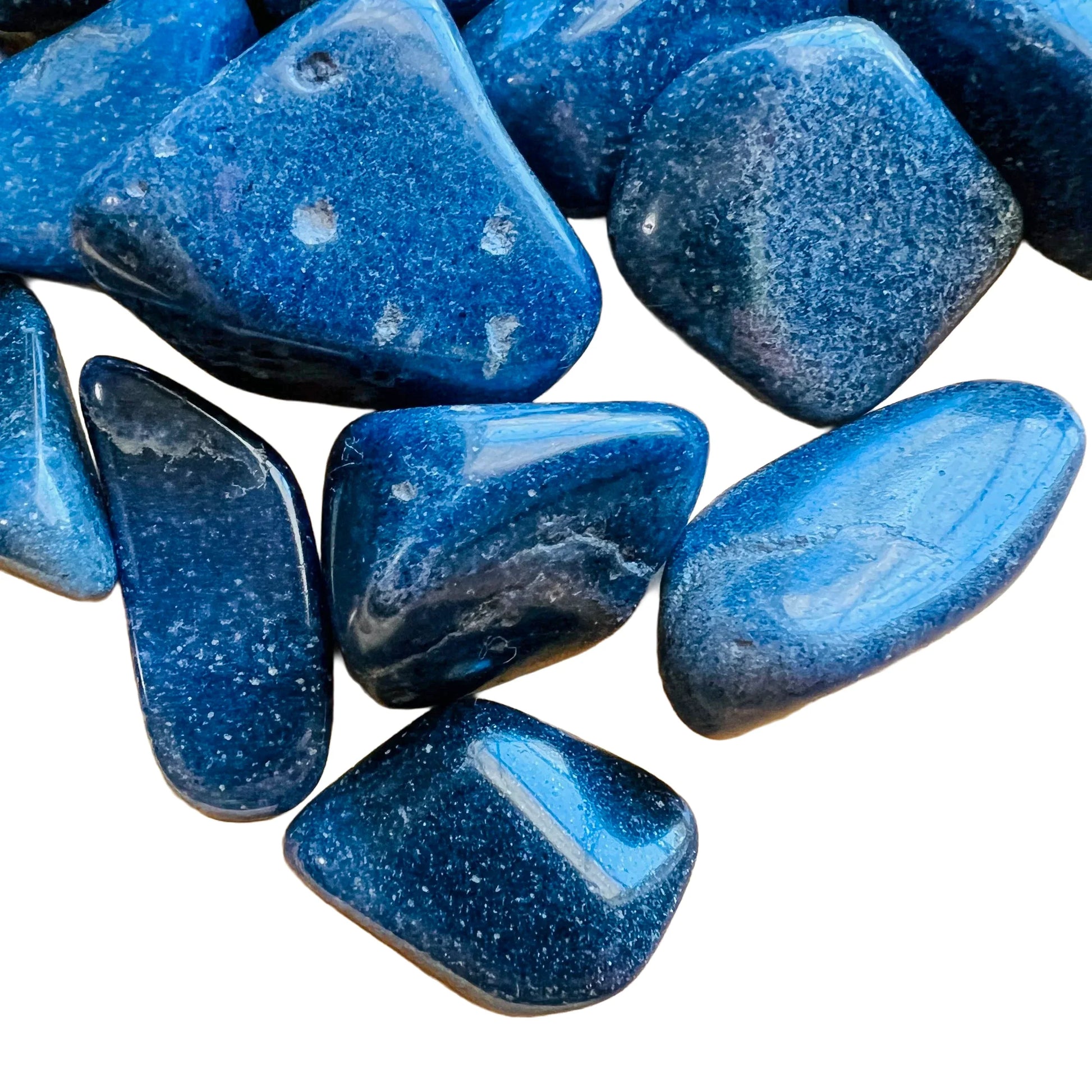 Side angle of Lazulite tumbled stone, hand-selected from Amoron'i Mania, Madagascar.