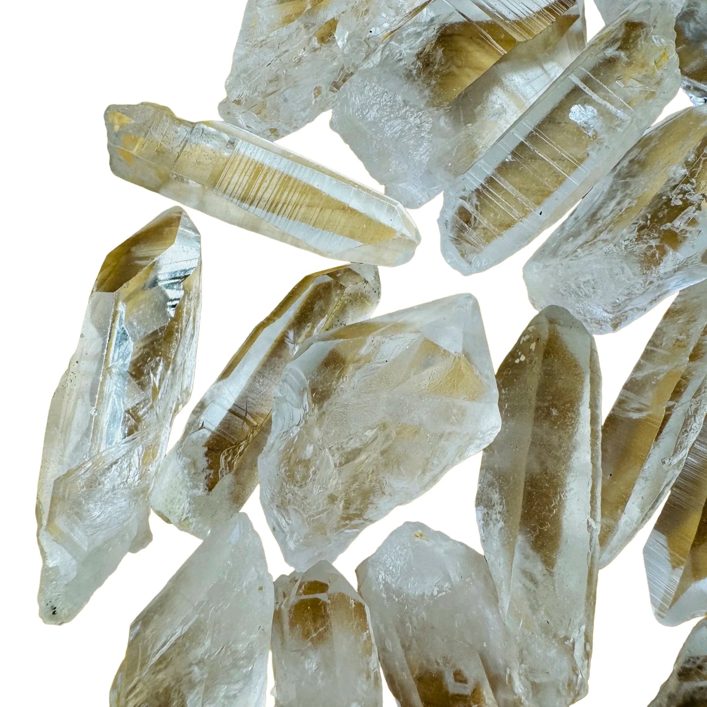 Color detail of Grade AA Lemurian Quartz raw point, showing natural inclusions.
