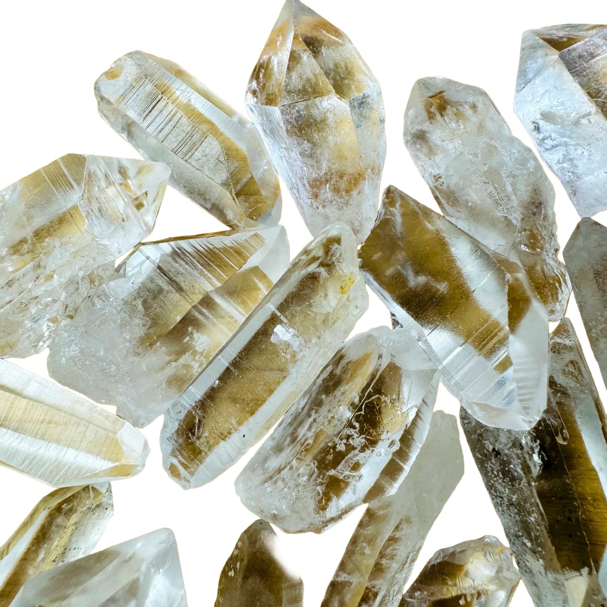 Side-on view of clear Lemurian Quartz raw point, showing characteristic finish.