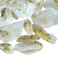 Texture-level view of Lemurian Quartz raw point, from Brazil, to support Meditation and Intuition.