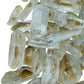 Side-on view of Lemurian Quartz raw point, from Minas Gerais, Brazil, often paired with practices around Meditation.
