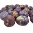 Natural surface of Lepidolite tumbled stone, showing natural texture.