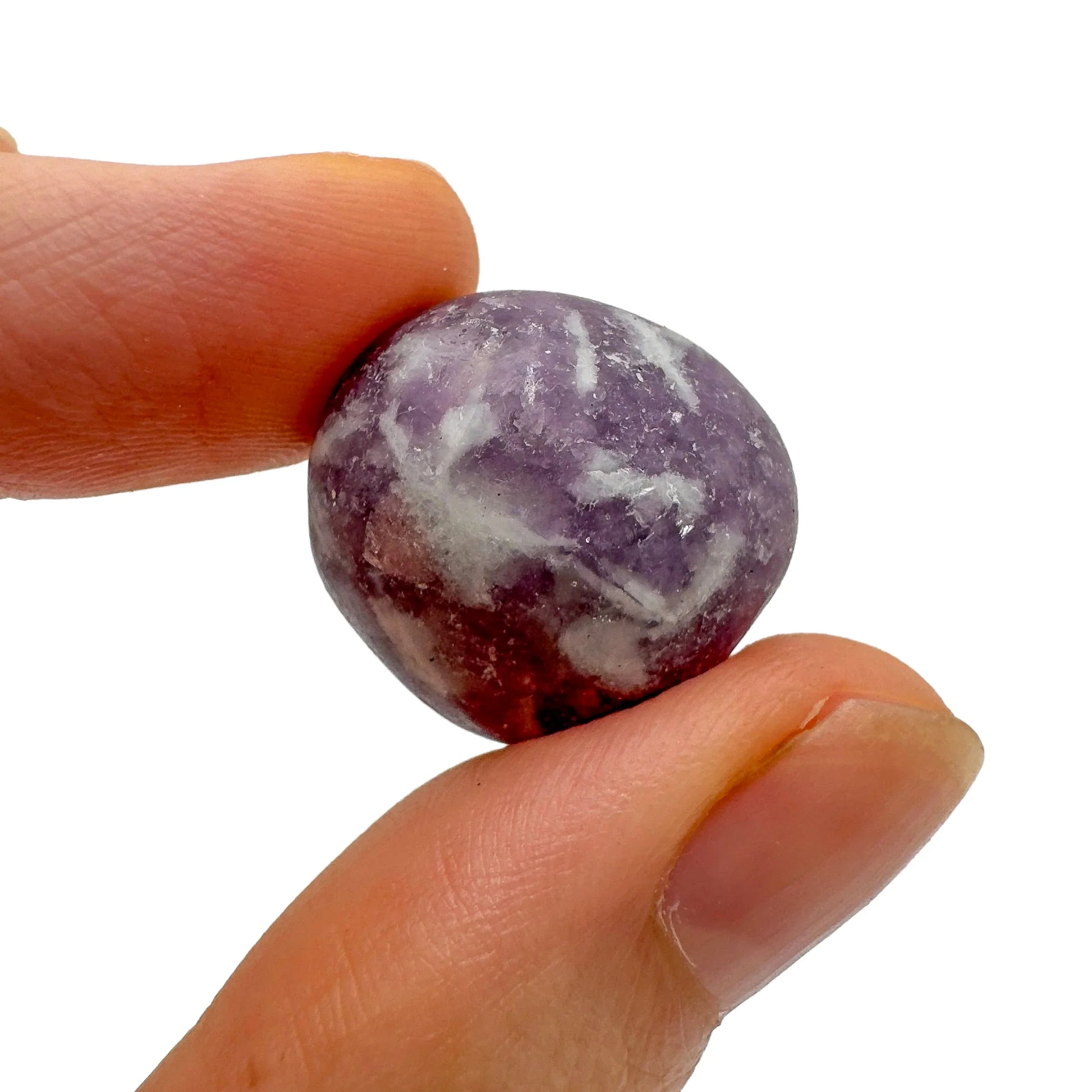 Scale reference of a single Lepidolite tumbled stone hand-selected from Arequipa, Peru.