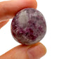 Back view of Grade AA Lepidolite tumbled stone showing natural surface