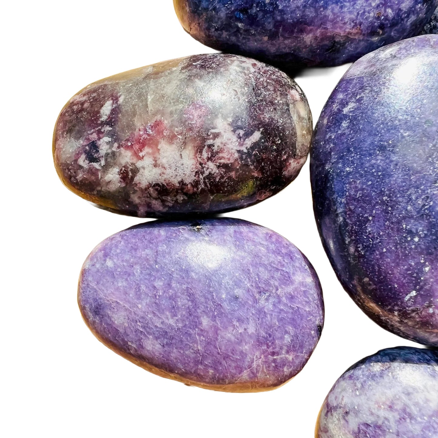 Worktop view of Lepidolite palm stone, from Vakinankaratra, Madagascar, shown for shape and scale.