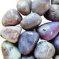 Overhead view of purple Lepidolite tumbled stone, often kept for Stress Relief.