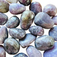 Alternate side of Lepidolite tumbled stone, showing natural variation, traditionally used for Stress Relief and Emotional Healing.