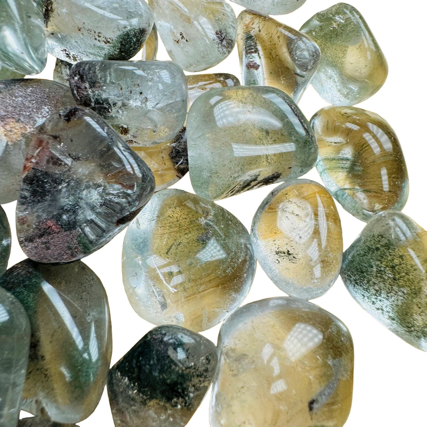Bird's-eye view of Lodolite tumbled stone, hand-selected from Brazil.