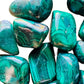 Edge view of Malachite tumbled stone, kept near for Emotional Healing and Protection.