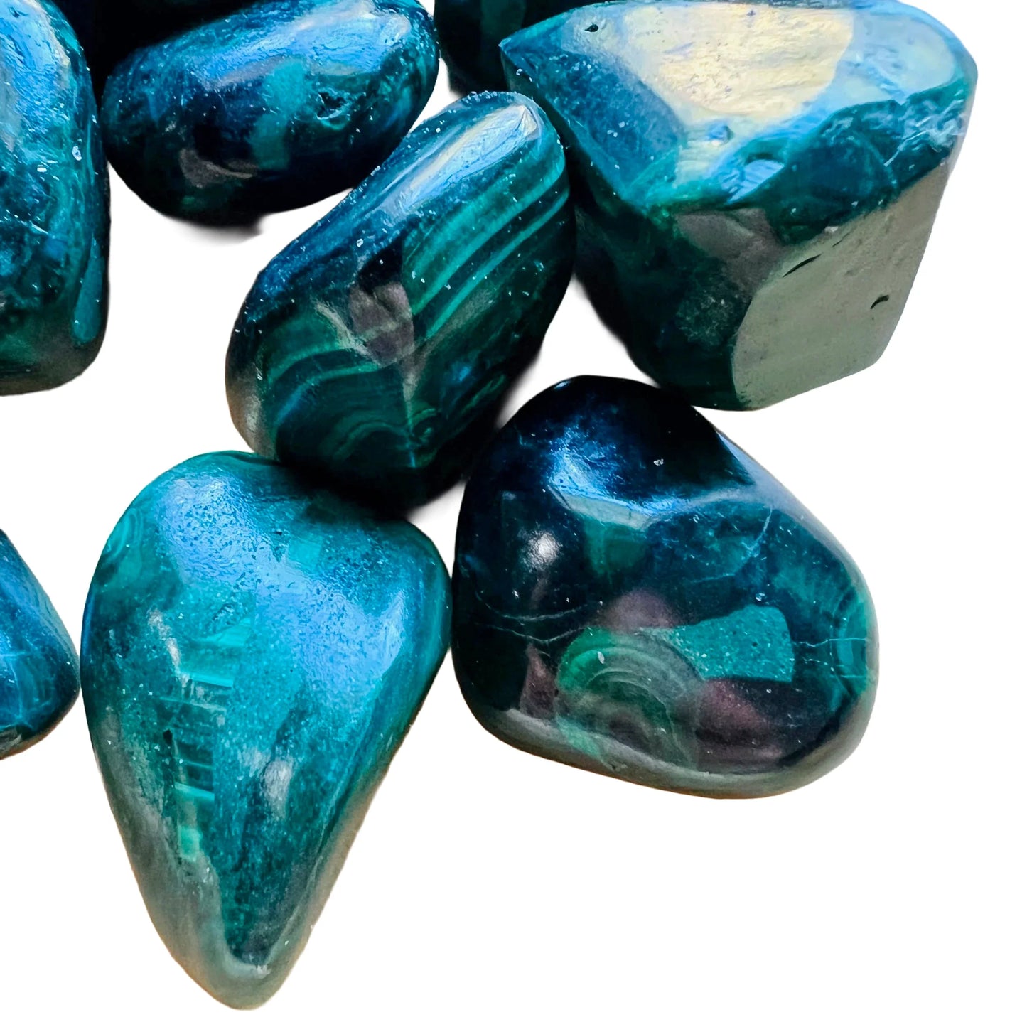 Reverse angle of green Malachite tumbled stone, showing matte finish, often worked with for Emotional Healing.
