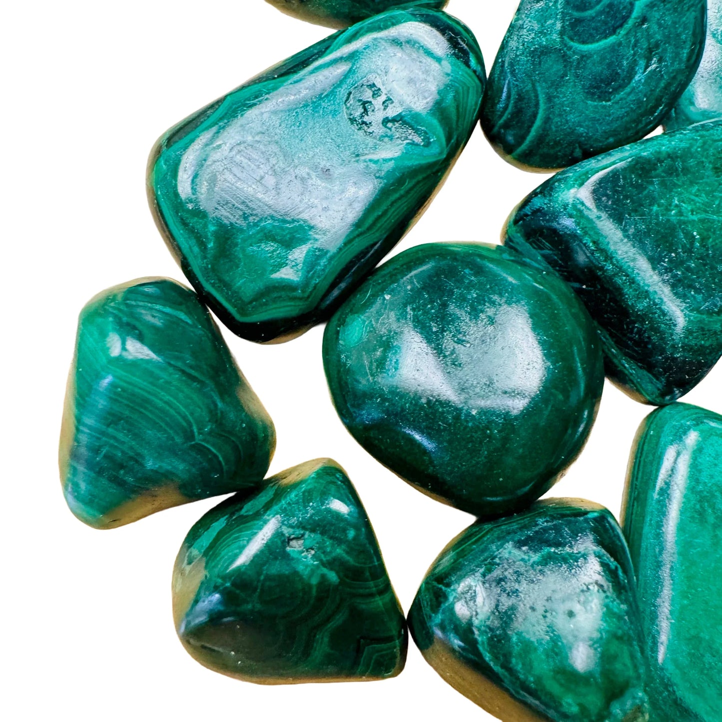 Profile shot of Malachite tumbled stone, showing soft luster, hand-selected from Haut-Katanga, Democratic Republic of the Congo.