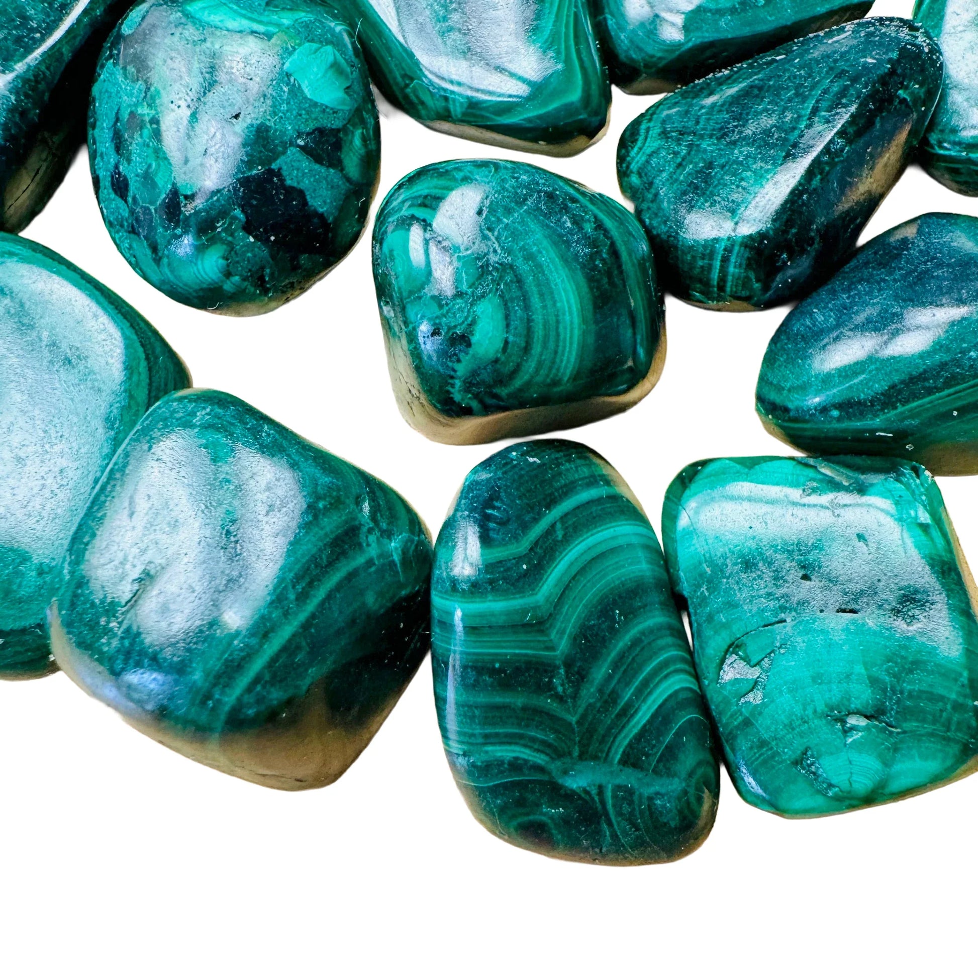 Reverse side of Malachite tumbled stone, showing soft luster.