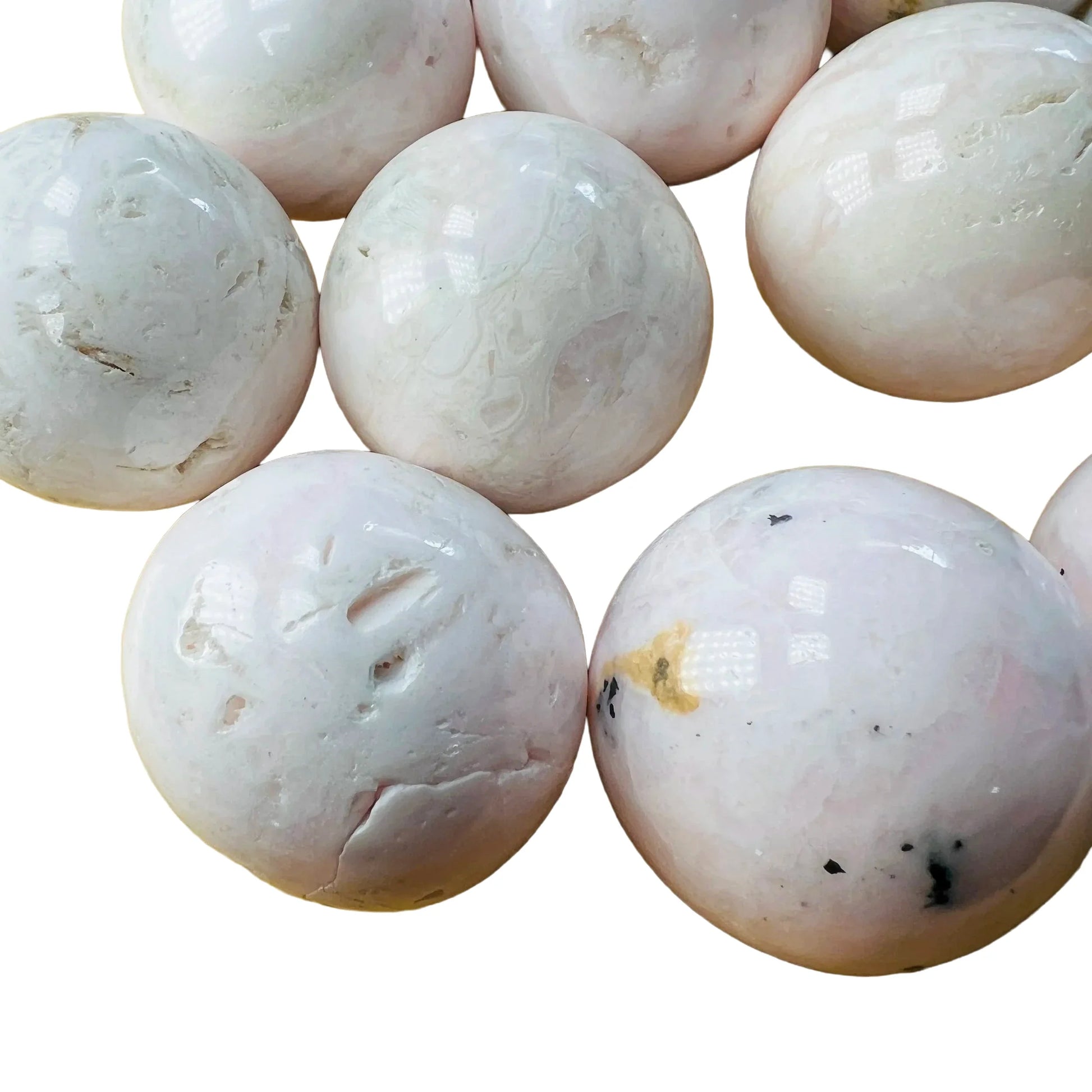 Edge view of Grade AAA Mangano Calcite tumbled stone, kept near for Emotional Healing.