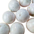 Top-side view of Mangano Calcite tumbled stone, to support Emotional Healing, from Ancash, Peru.