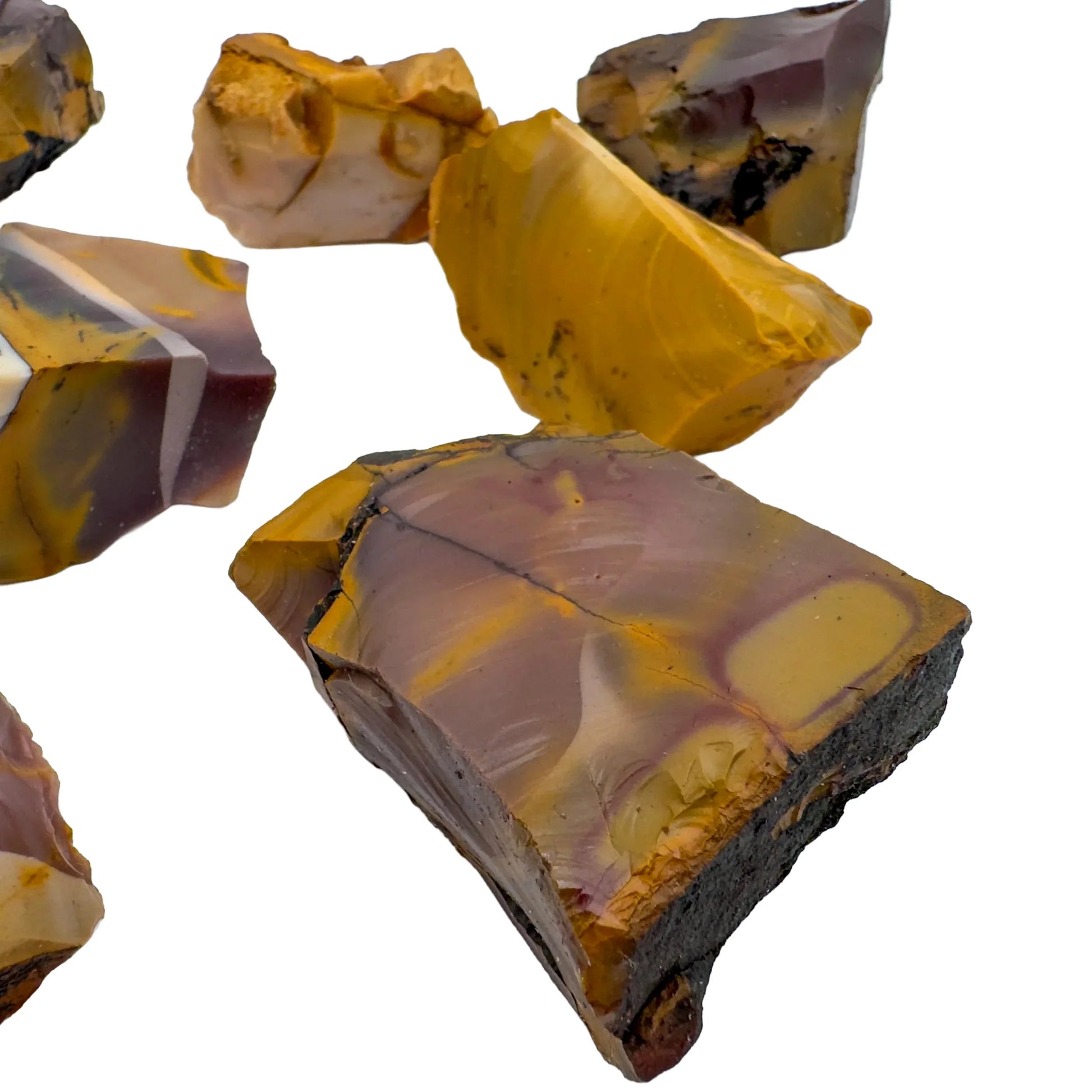 Profile view of Grade AA Mookaite raw stone, showing natural form, traditionally used for Grounding.