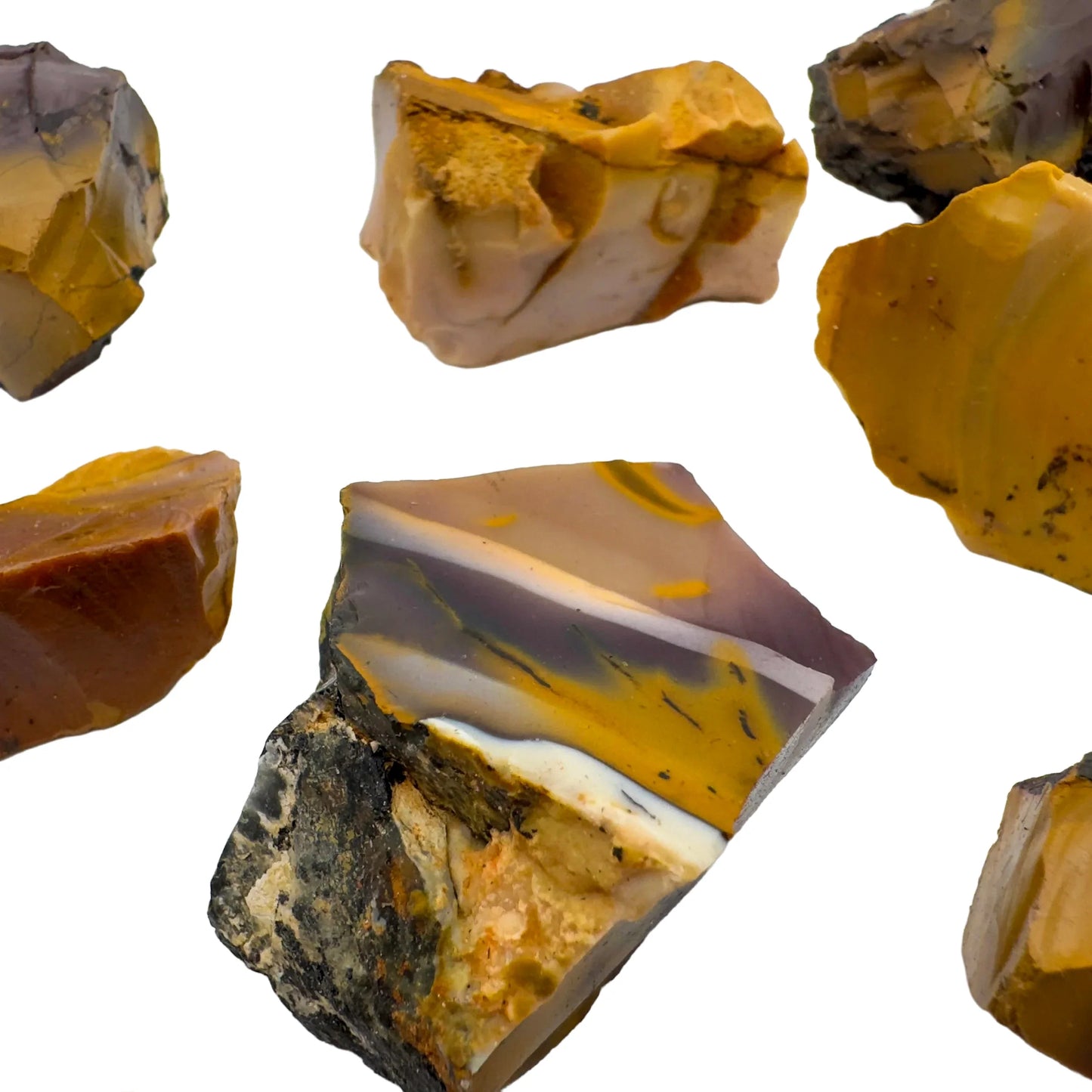 Top-down shot of Mookaite raw stone, sourced from Western Australia, Australia, linked to Grounding and Adventure.