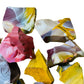 Grouping of raw Mookaite jasper, Grade AA, natural ochre and burgundy patterning