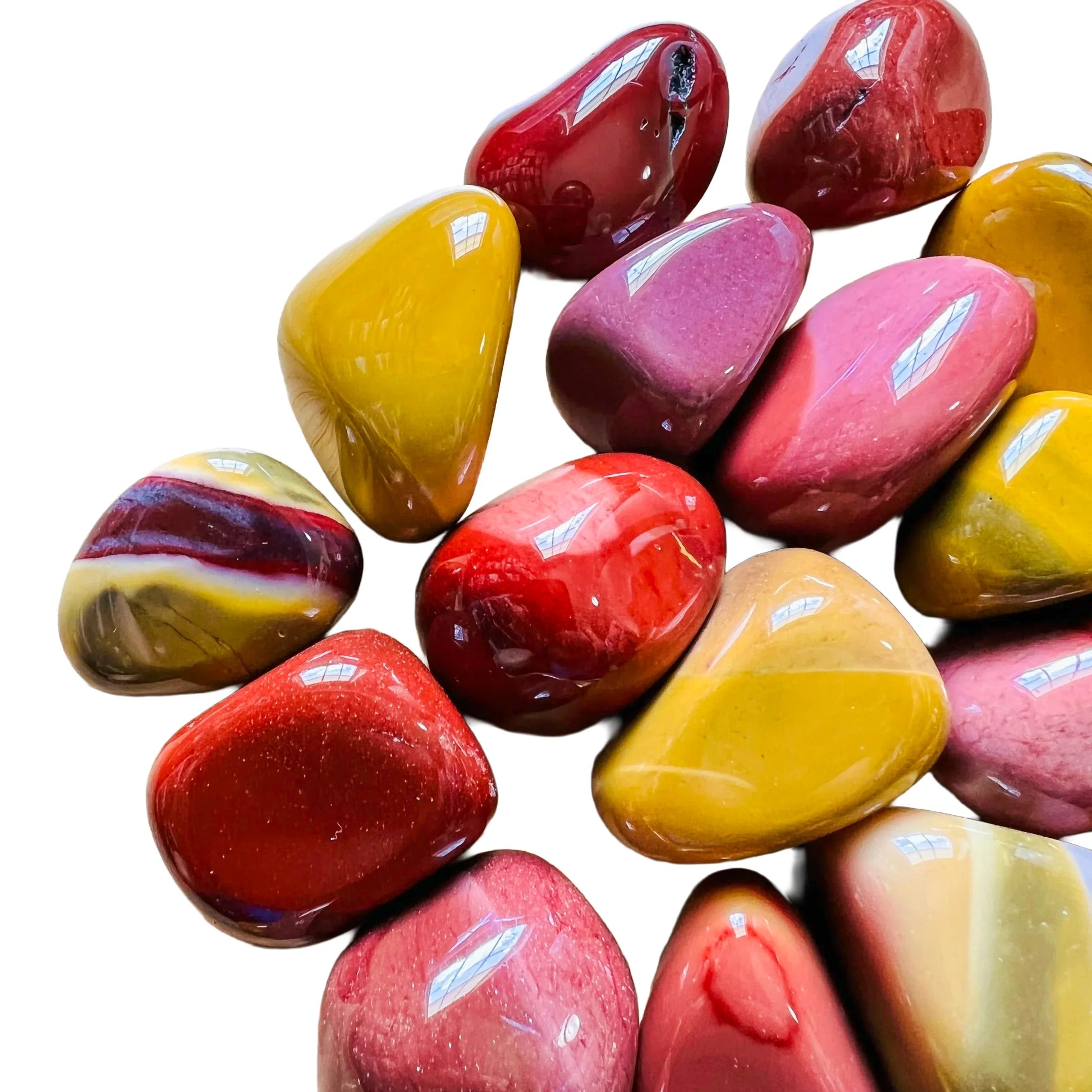 Side profile of Mookaite tumbled stone, hand-selected from Australia, showing natural variation.