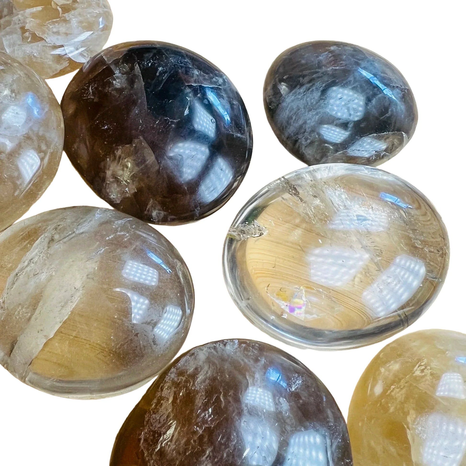 Overhead angle of Grade A Natural Citrine palm stone, Madagascar-sourced, showing color depth.