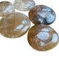 Reverse side of Natural Citrine palm stone, showing characteristic finish.
