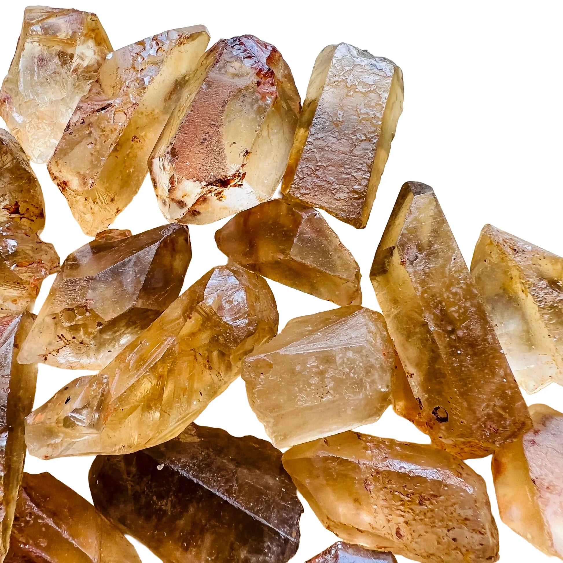 Top-down shot of Natural Citrine raw point, from Minas Gerais, Brazil, showing natural color depth.