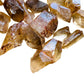 Opposite side of Natural Citrine raw point, showing characteristic color.