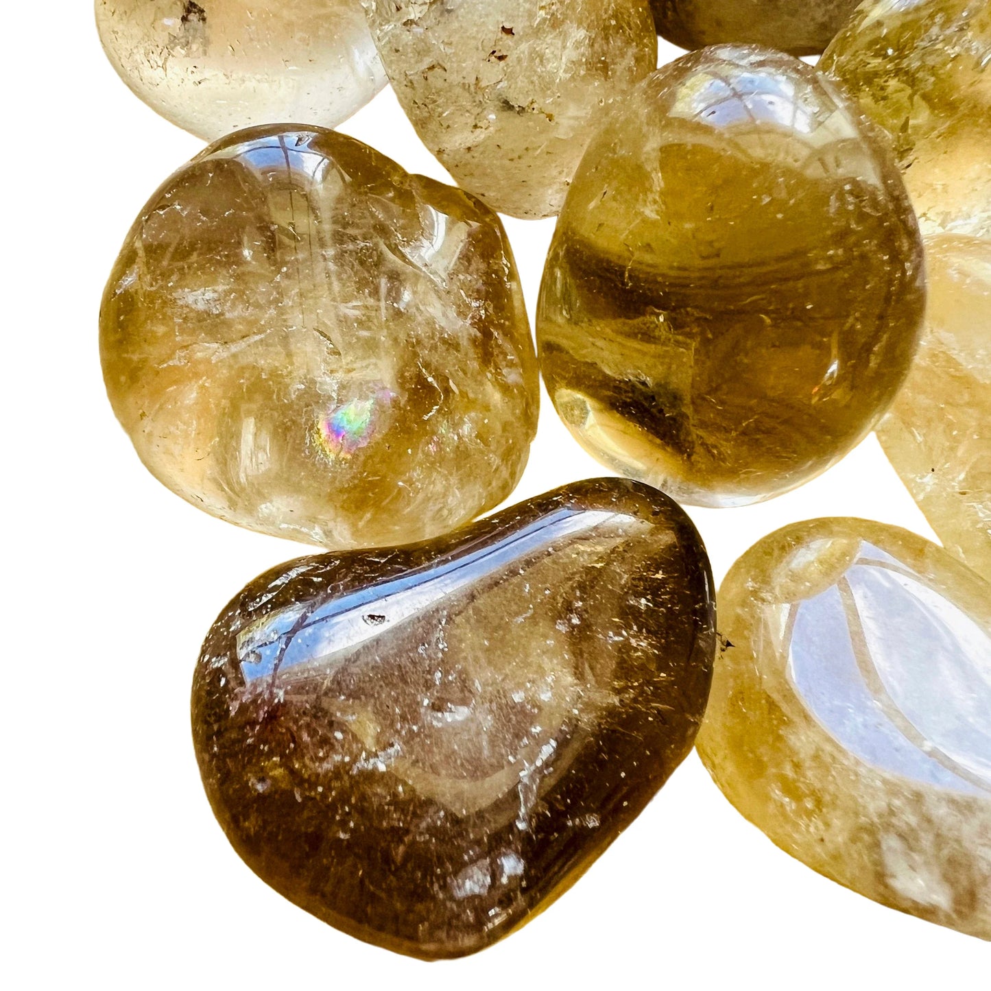 Reverse angle of Natural Citrine tumbled stone, sourced from Minas Gerais, Brazil, turned to for Abundance.