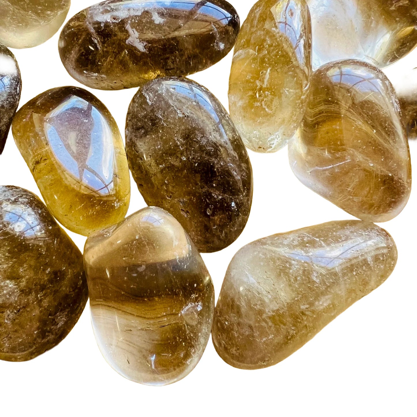 Top view of Natural Citrine tumbled stone, showing characteristic color, hand-selected from Minas Gerais, Brazil.