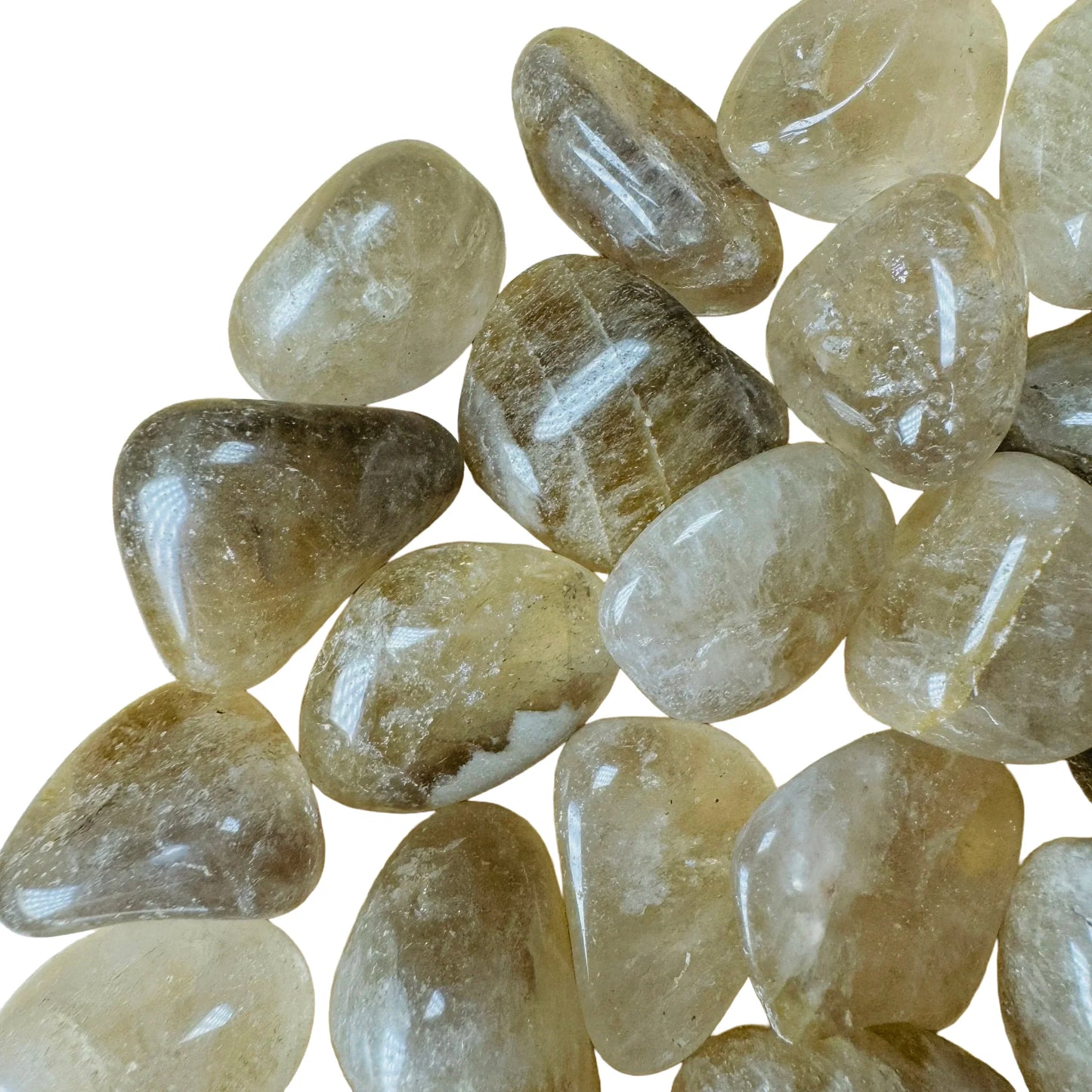 Top-down shot of Natural Citrine tumbled stone, sourced from Brazil.